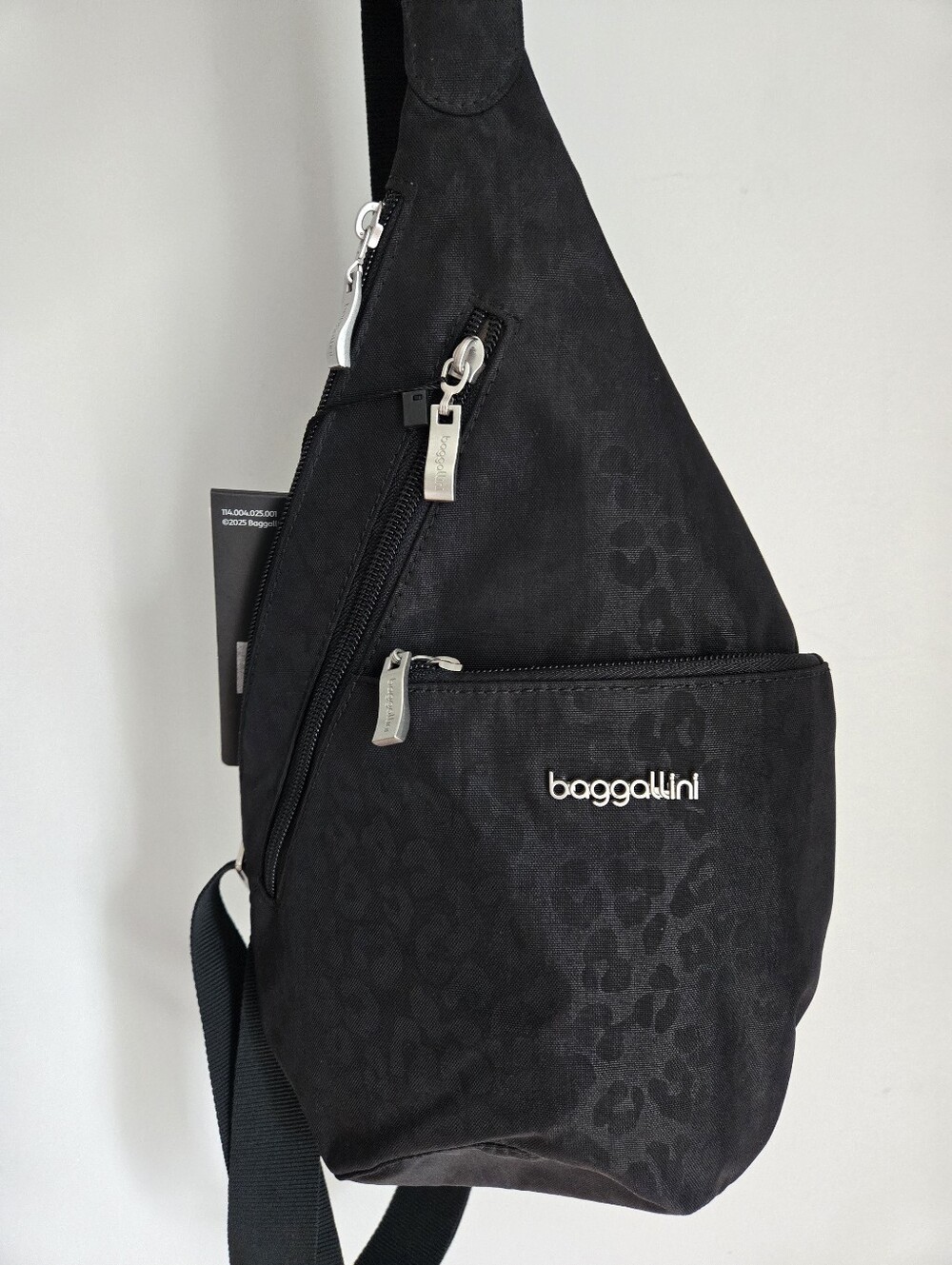 New BAGGALLINI Mini Sling - Black Cheetah Emboss